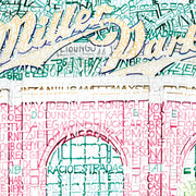 Portrait of Miller Park Milwaukee Brewers Stadium sign in green and yellow above red stadium entrance with hand-drawn words.