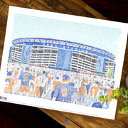 Unframed Shea Mets Stadium print made with blue and orange handwritten names of every Met in history (1962-2008) on table.
