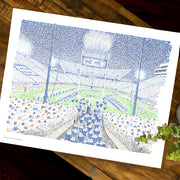 Unframed Penn State Football Stadium print made with handwritten words comprised of stats about Beaver Stadium on table.