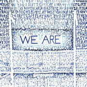 The words “We Are” between goalposts at Beaver Stadium on artwork made with handwritten words of stats over decades. 