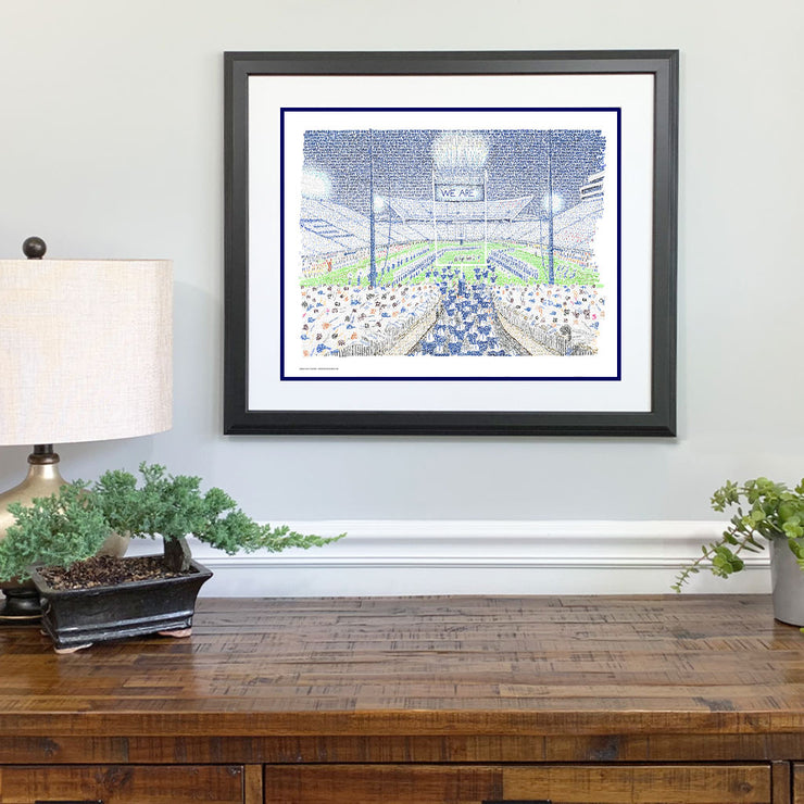 Framed Penn State Football Stadium print made with handwritten words comprised of stats from Beaver Stadium above dresser.