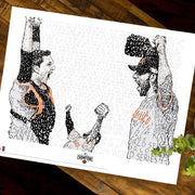 Unframed word art print celebrating SF Giants who won the World Series in 2014 lies flat on wood table next to small plant.