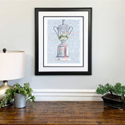 Framed US Open Trophy print made in handwritten words of every year, location, and winner of US Open above wood dresser.