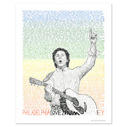 Unframed Paul McCartney poster made of green, yellow, and orange hand-written words of all his Philadelphia concerts.
