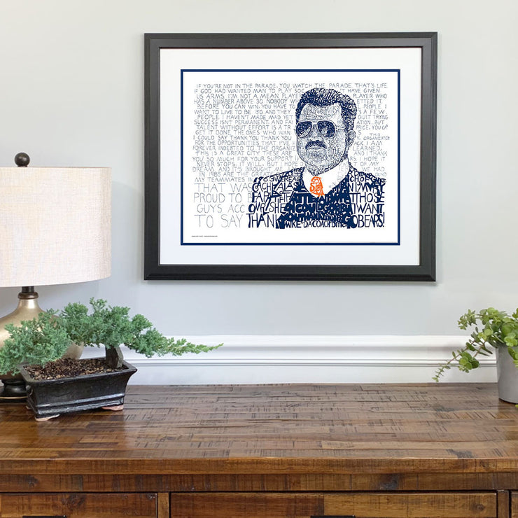 Chicago Bears Gift hand-drawn portrait of Chicago Bears Mike Ditka with words and in blue and orange above wood dresser.