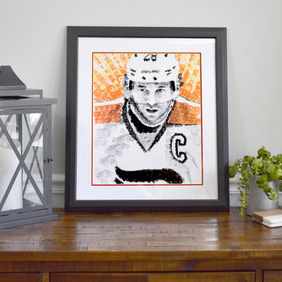Unique piece of Claude Giroux decor: matted and framed original portrait created only from Philadelphia Flyer logo ink stamps.
