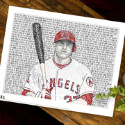 Black, red, white portrait of Angels 2014 MVP Mike Trout wall art with hand-drawn words about his career on wood table.