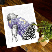 Unframed Ray Lewis Ravens football player artwork made of handwritten words about Ravens 2012 championship on wood table.