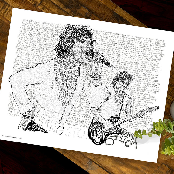 Unframed Rolling Stones art of Jagger and Richards made of handwritten song titles from the band’s first 20 years on table.